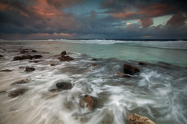  reef side of the atoll at dusk on a day of high winds and intermittent 