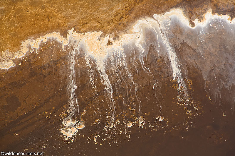 Aerial view of evaporated sodium compound trails at lake shore, Lake Natron, Tanzania, Canon 5D MK3, Canon 24-105mm, f4 IS lens @88mm, handheld, 1/1,600 sec, f4, ISO 400, AV at 0