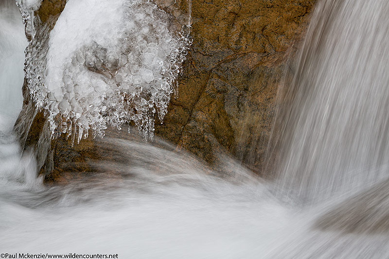 38. Water flowing past rock and ice, Jigokudani, Japan